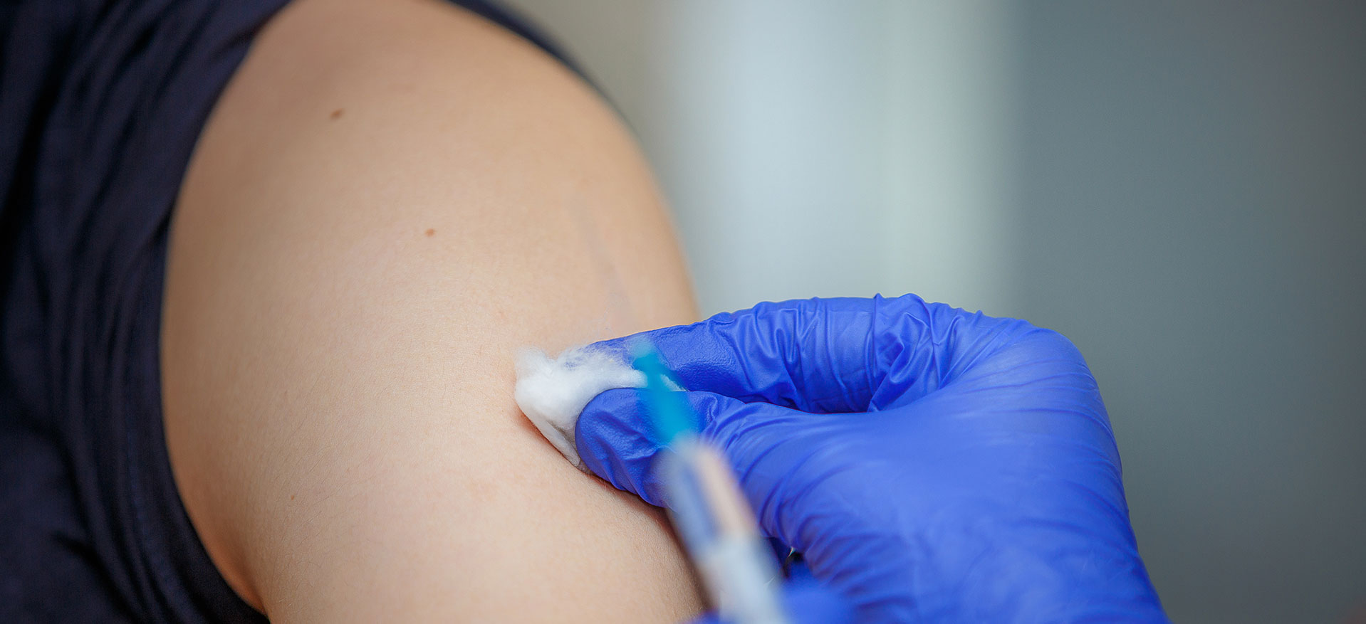 arm getting flu vaccine